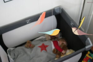 Baby sleeping in cot